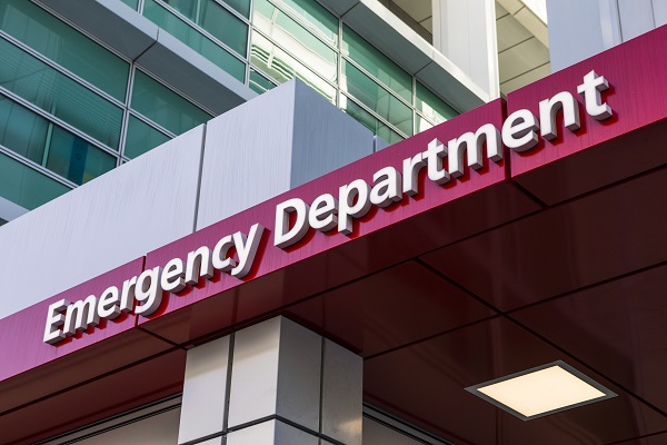 A sign above the entrance to an Emergency Department at a hospital.