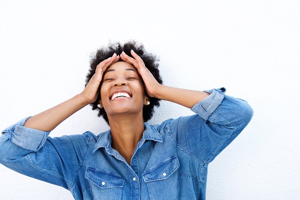 Close up portrait of young woman laughing