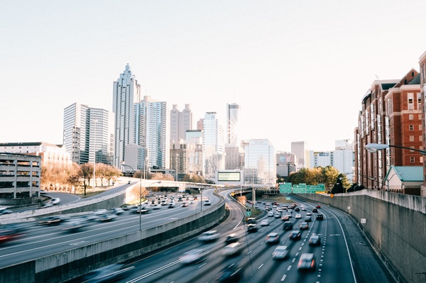 Cars on an Atlanta highway during the day with the cityscape in the background. (308529716)