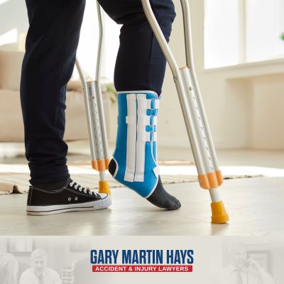 A personal injury victim tests out their crutches after an injury in Georgia